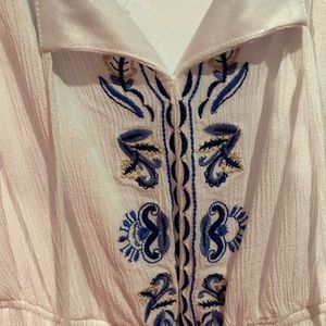 White and blue romper size medium